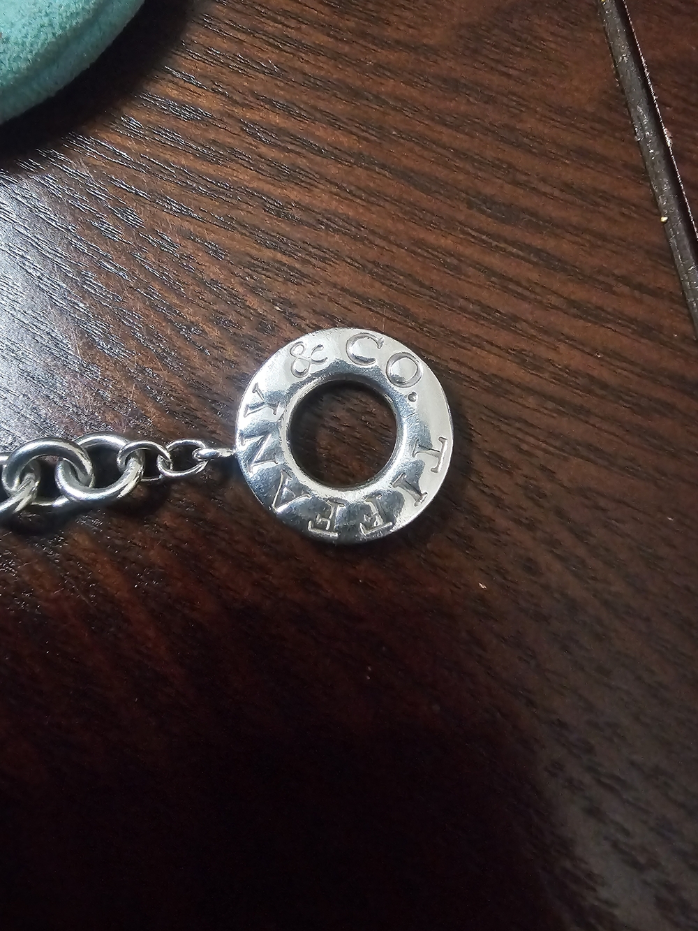 Tiffany & Co. Silver Round Logo Donut Charm Bracelet